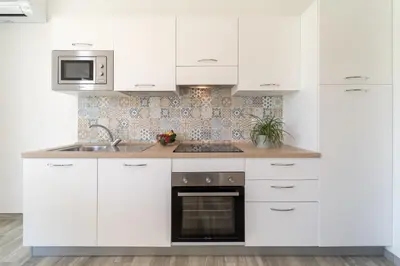 Cucina o angolo cottura di GuestHost - Borgo 84 Marzamemi - Marza Bedda Flat