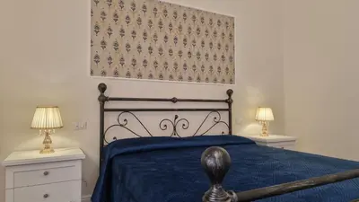Letto o letti in una camera di Ancients Courts of Catania