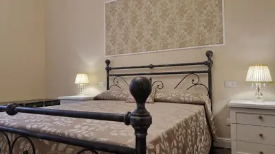 Letto o letti in una camera di Ancients Courts of Catania