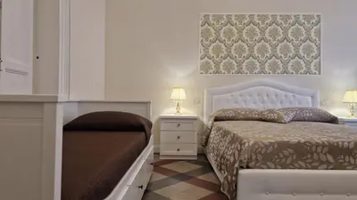 Letto o letti in una camera di Ancients Courts of Catania