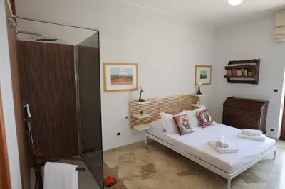 Letto o letti in una camera di Casa Ninni