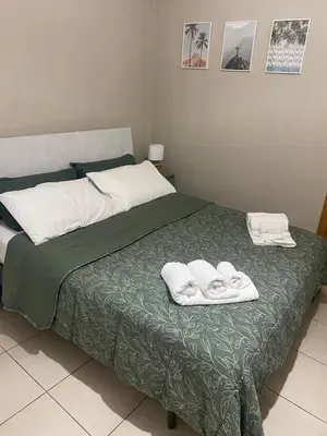 Letto o letti in una camera di Copacabana house