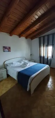 Letto o letti in una camera di Beb Eclissi