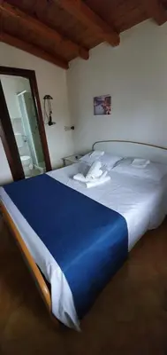 Letto o letti in una camera di Beb Eclissi