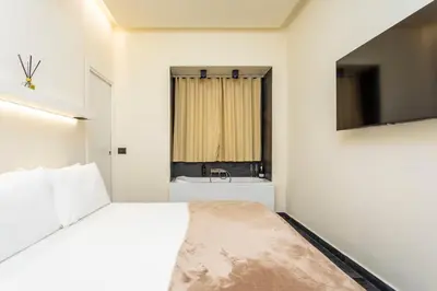 TV o dispositivi per l'intrattenimento presso Marina Home - Luxury Apartament