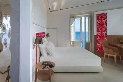 Letto o letti in una camera di Maniace Boutique Hotel Ortigia | UNA Esperienze