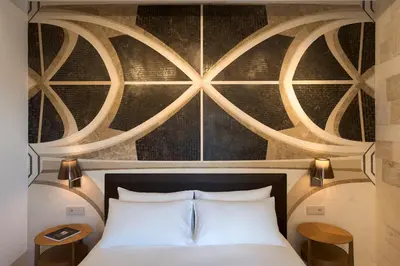 Letto o letti in una camera di Maniace Boutique Hotel Ortigia | UNA Esperienze