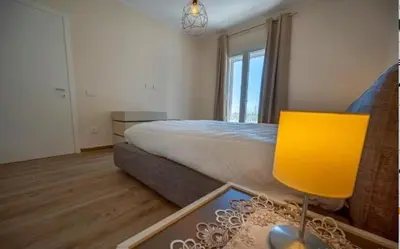 Letto o letti in una camera di Appartamento Due Mari - SiciliaVacanza