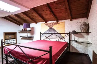 Letto o letti in una camera di Casa Gisira