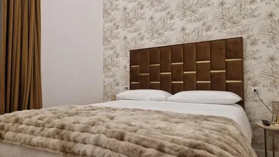 Letto o letti in una camera di La Maison del Duomo