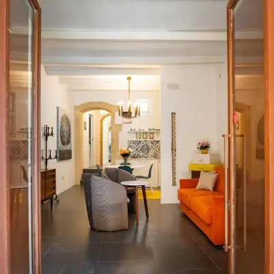 Area soggiorno di Ortigia Courtyard Apartment by Ortigia Apartments