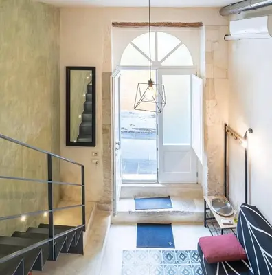 Area soggiorno di Gargallo Loft in Ortigia