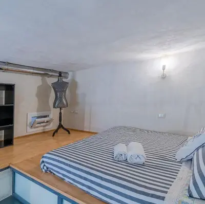 Letto o letti in una camera di Gargallo Loft in Ortigia