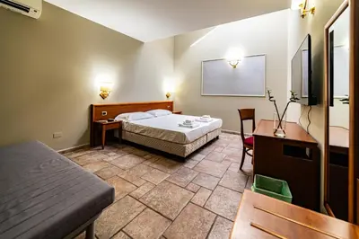 Letto o letti in una camera di Malìa Home