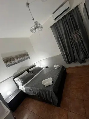 Letto o letti in una camera di Diletta house