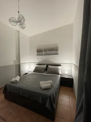Letto o letti in una camera di Diletta house