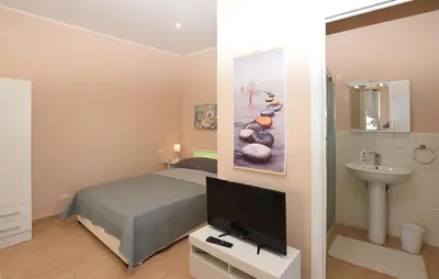 TV o dispositivi per l'intrattenimento presso Stunning Apartment In Augusta