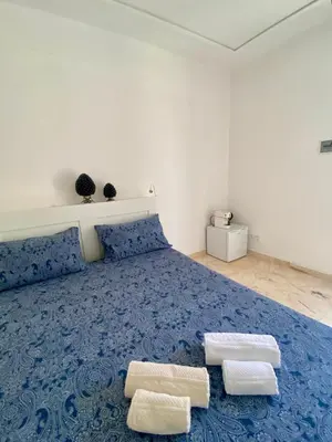 Letto o letti in una camera di La Logghia rooms