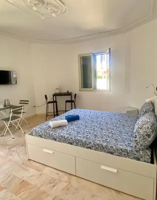 Letto o letti in una camera di La Logghia rooms