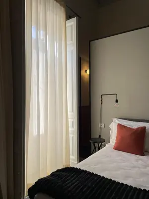 Letto o letti in una camera di B&B Cinquequinte
