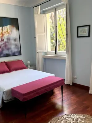 Letto o letti in una camera di Numeroquattro- Light blue appartamento in Villa con giardino e piscina