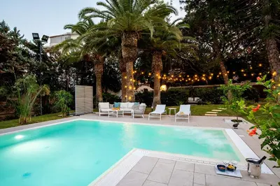 Piscina di Numeroquattro- Light blue appartamento in Villa con giardino e piscina o nelle vicinanze