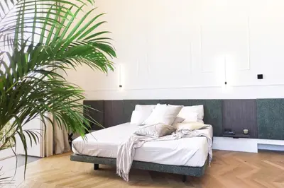 Letto o letti in una camera di THE PLACE Ortigia