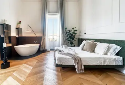 Letto o letti in una camera di THE PLACE Ortigia