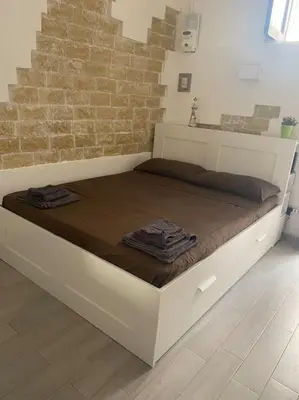 Letto o letti in una camera di Arethusa Loft