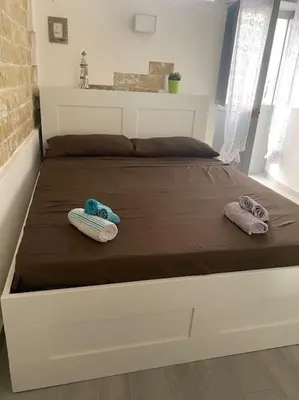 Letto o letti in una camera di Arethusa Loft