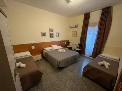 Letto o letti in una camera di B&B Melibleo