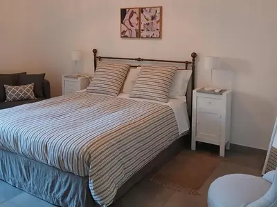 Letto o letti in una camera di Casa Arancio