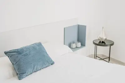 Letto o letti in una camera di DimoraArsenale