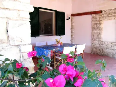 Patio o area all'aperto di Casa Vacanza Ondablu CaseSicule, on the Beach with big Veranda and Wifi