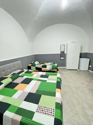 Letto o letti in una camera di La torre del duomo 2