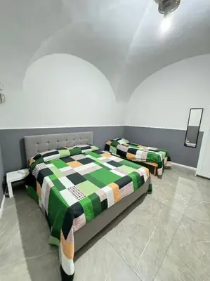 Letto o letti in una camera di La torre del duomo 2