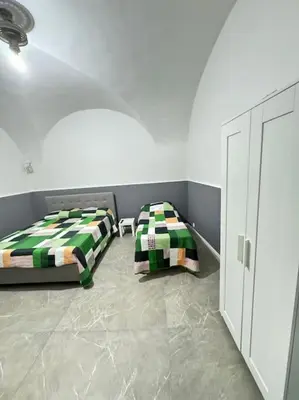 Letto o letti in una camera di La torre del duomo 2