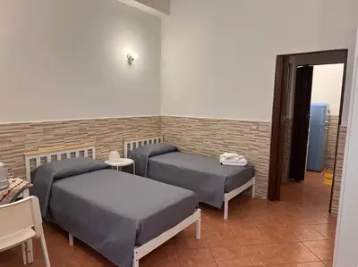 Letto o letti in una camera di Il rifugio Comoda e accogliente Casetta
