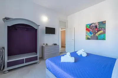Letto o letti in una camera di Theatron