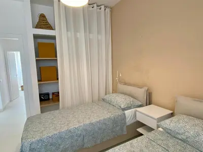 Letto o letti in una camera di Villa Aroi