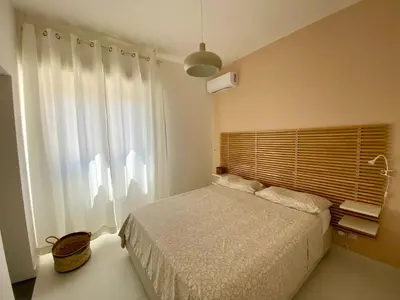 Letto o letti in una camera di Villa Aroi