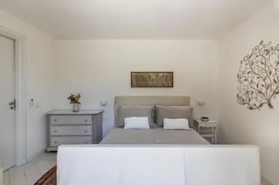 Letto o letti in una camera di Helorus Noto - Gioi Villa con piscina