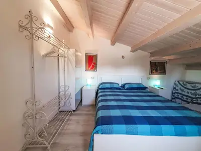 Letto o letti in una camera di Apartment Casa di Arianna by Interhome