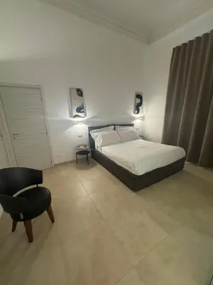 Letto o letti in una camera di Nanè Maison