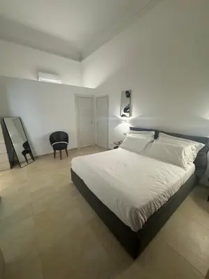 Letto o letti in una camera di Nanè Maison