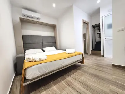 Letto o letti in una camera di La Casa di Elio