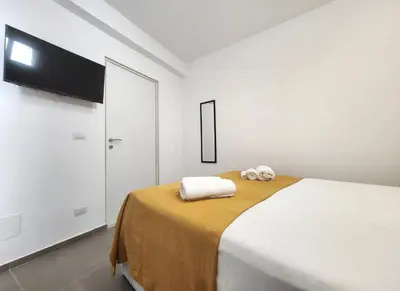 Letto o letti in una camera di La Casa di Elio