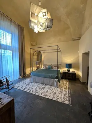 Letto o letti in una camera di Dimora Enricuzzo Modica
