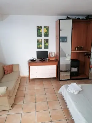 Letto o letti in una camera di Monolocale Cappuccini