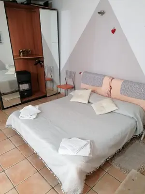 Letto o letti in una camera di Monolocale Cappuccini